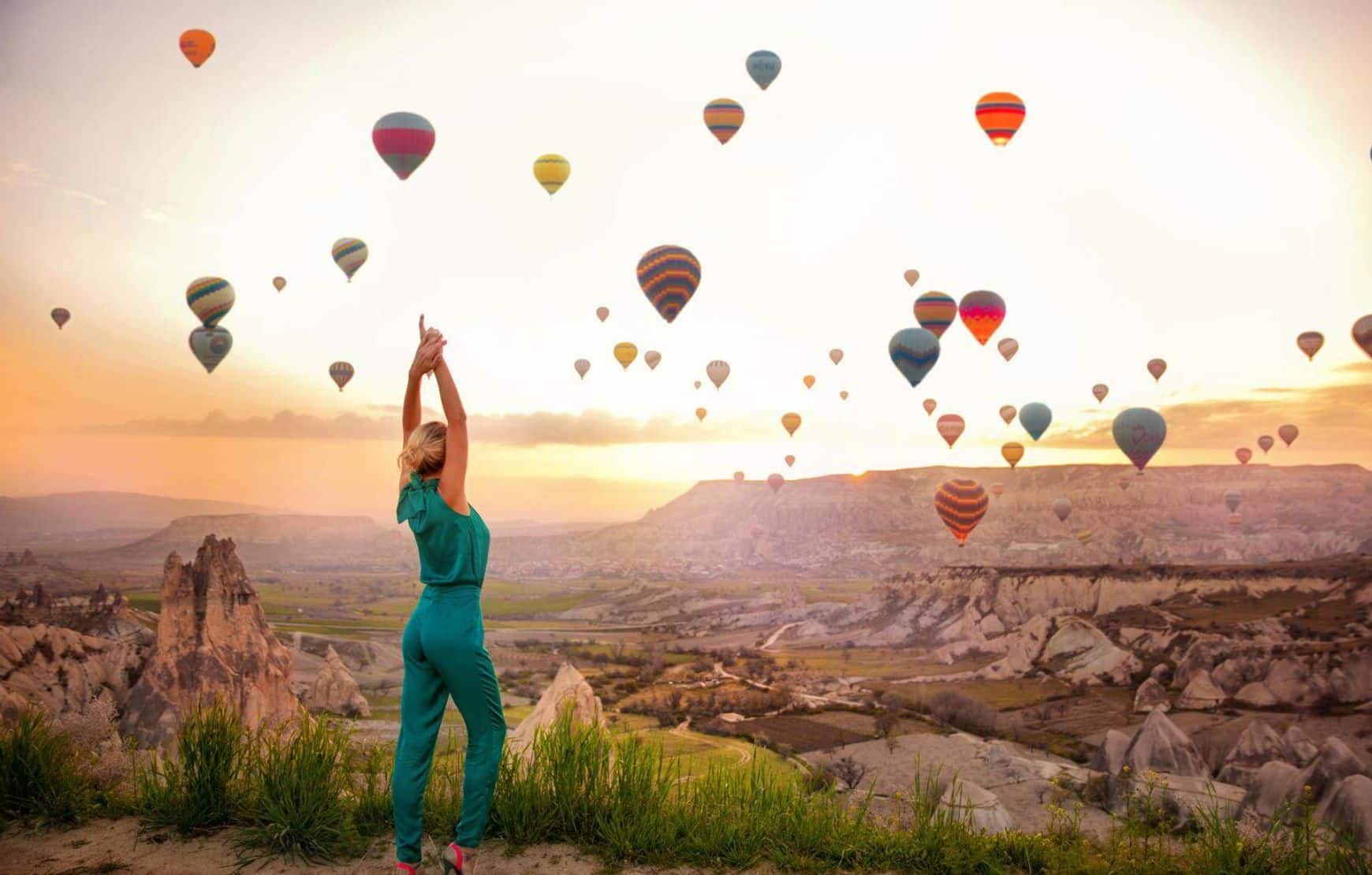 a women in Cappadocia Balloon Watching Tour doing yoga