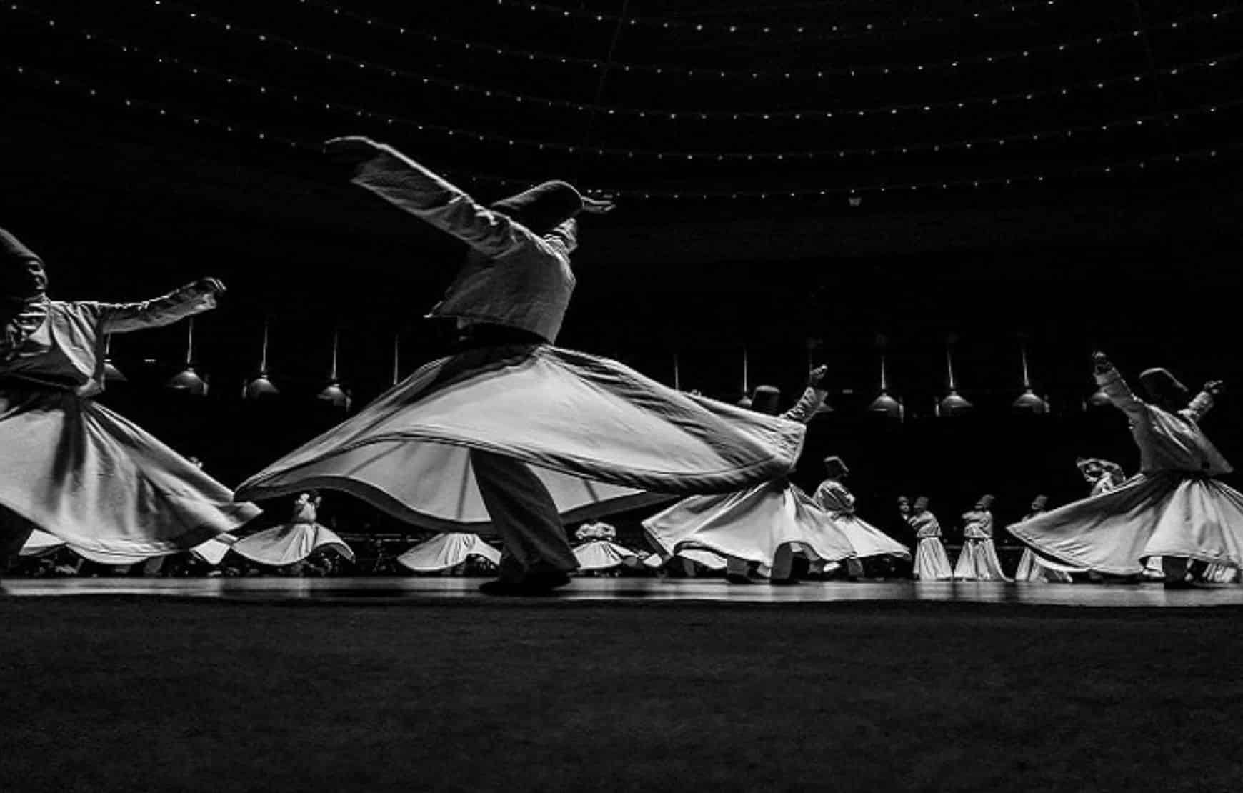 Dervish ceremony in cappadocia - whirling dervishes black and white