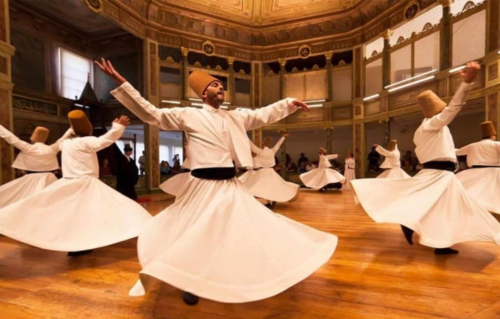 Dervish ceremony in cappadocia - whirling dervishes in a hall