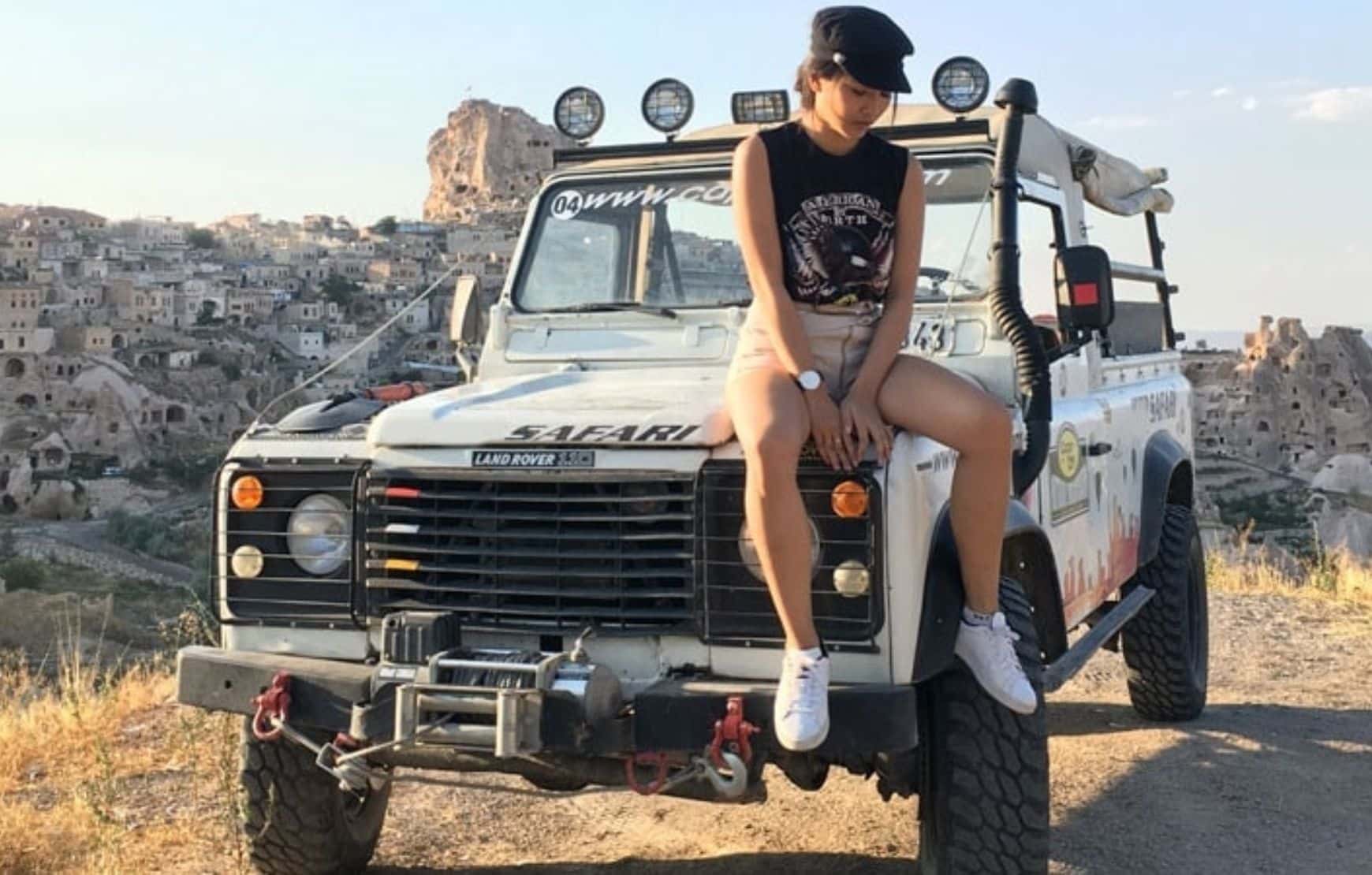 Jeep Safari in Cappadocia - a girl sitting on jeep