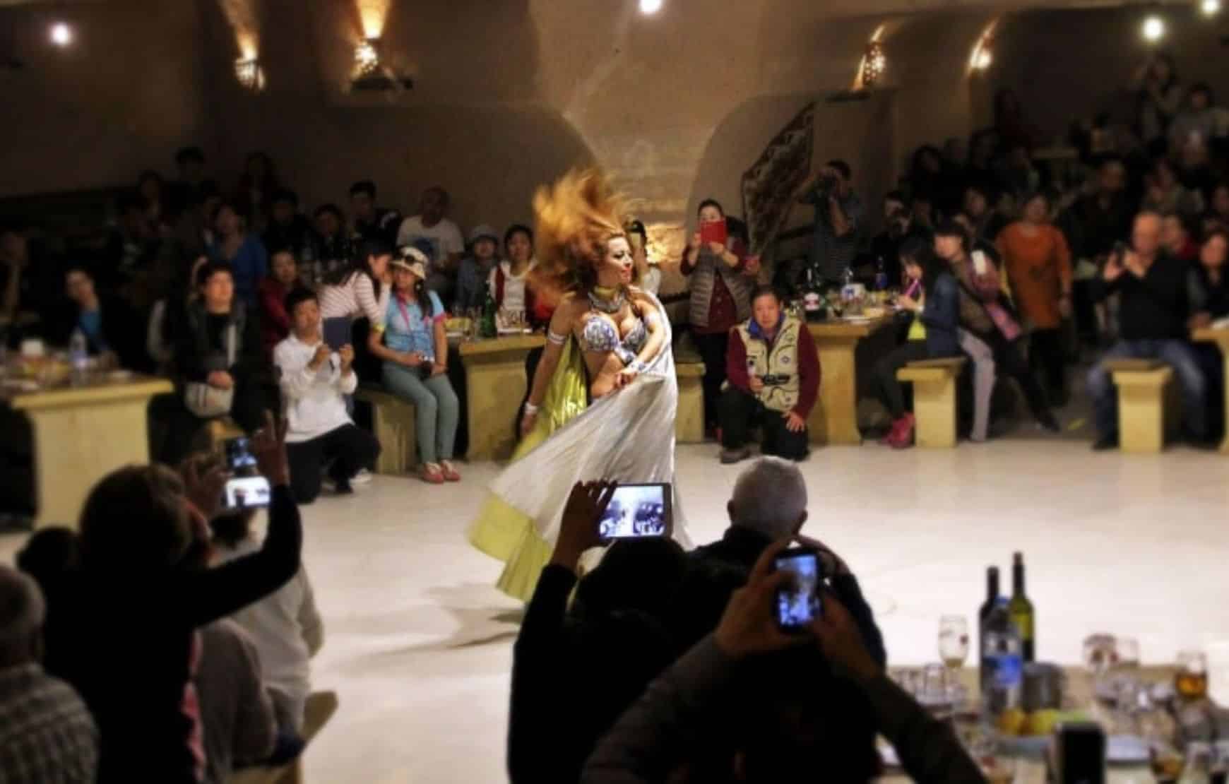 Turkish Night Show in Cappadocia - turkish belley dancer on the stage.