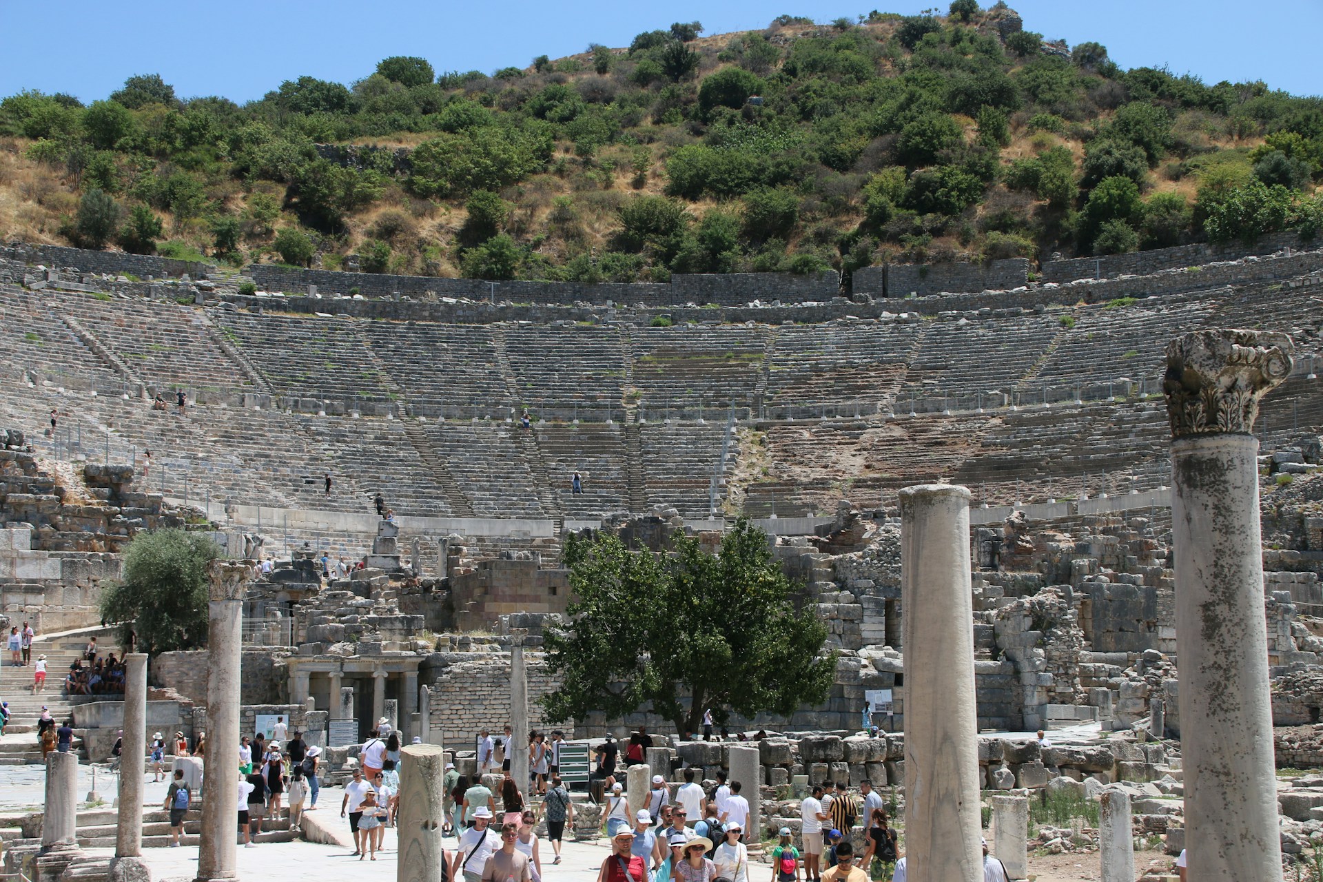 a crowd of people in front of great theatre